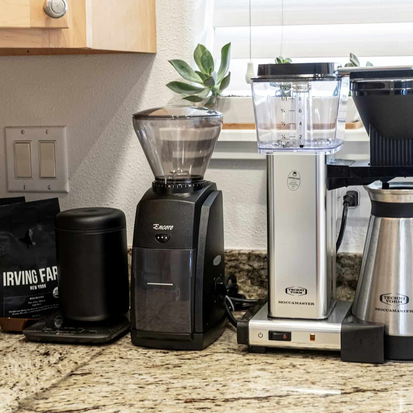 A black and grey countertop blender