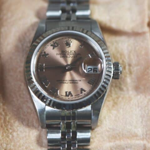 Ladies Rolex Oyster Perpetual Datejust 79174 with a pink dial, fluted bezel and jubilee bracelet